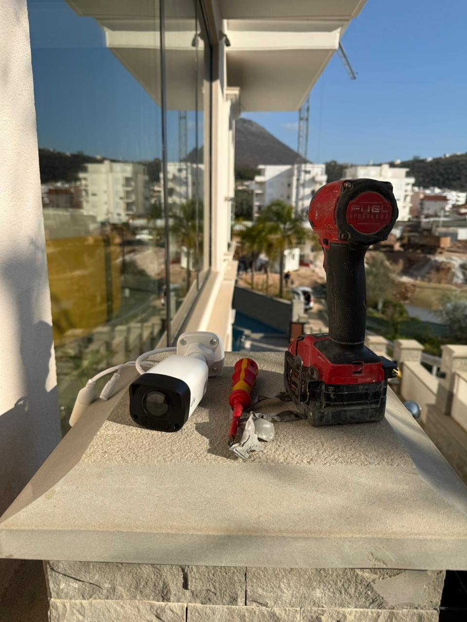 Solvex technicians installing a security system on-site